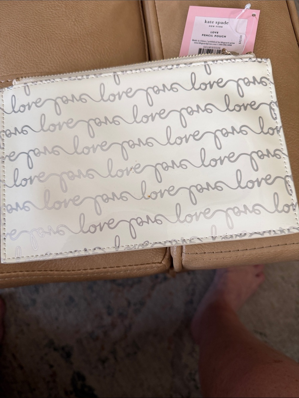 Kate Spade love pencil pouch full disclosur contents have been removed tags on